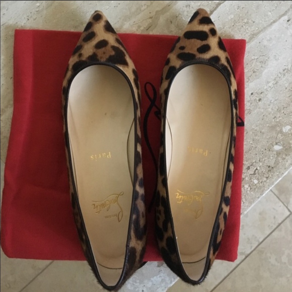 Louboutin cheetah pointed toe flats